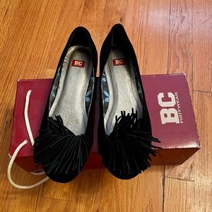 BC Footwear black flats with tassle details